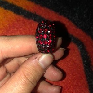 Black ring with red gemstones size 8